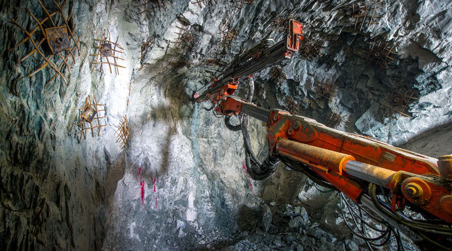 Underground rock drilling